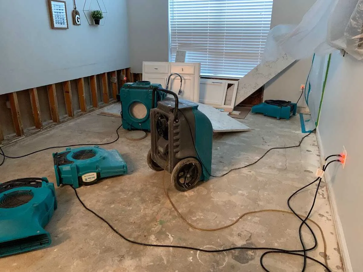 Dehumidifier in flood-cut room for Water Damage Restoration in Wharton